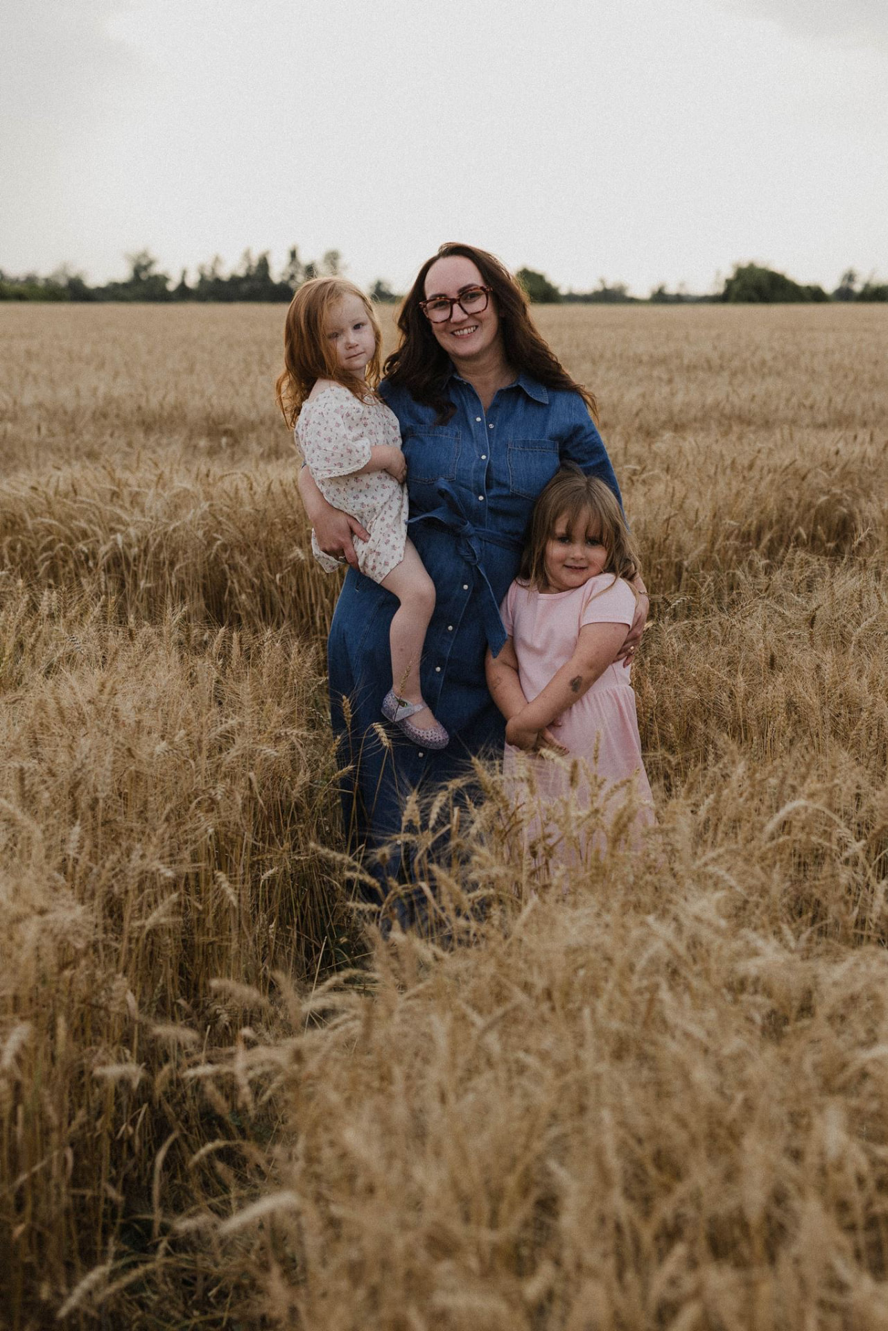 Samantha Turner with her family in a Douro-Dummer wheat field