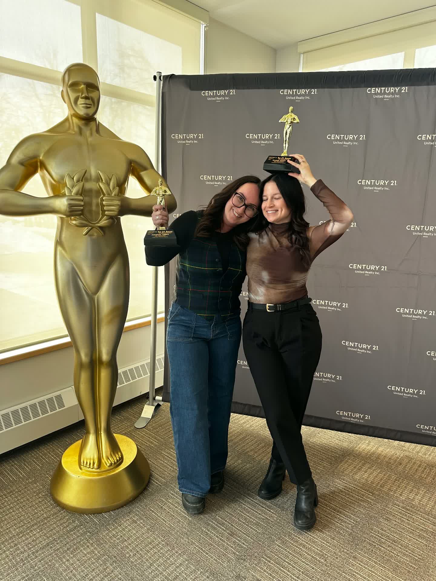 Samantha Turner receiving a top producer award